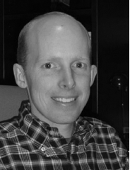 A profile box displays Ryan Watkins s portrait, job title and affiliation, program and university, office address, phone number, and website below the photo.