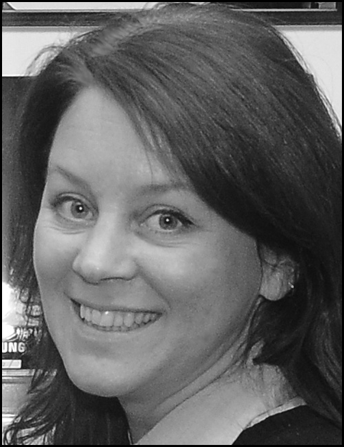 A photograph of Michelle Estable.