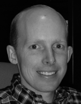 A professional contact card for Ryan Watkins with his academic title and website.