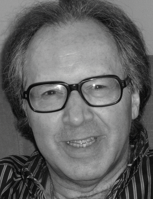 Man with long hair, glasses, and striped shirt smiles in a headshot. Labelled, Errol Craig Sull, Adjunct Professor, Department of English, Drexel University.