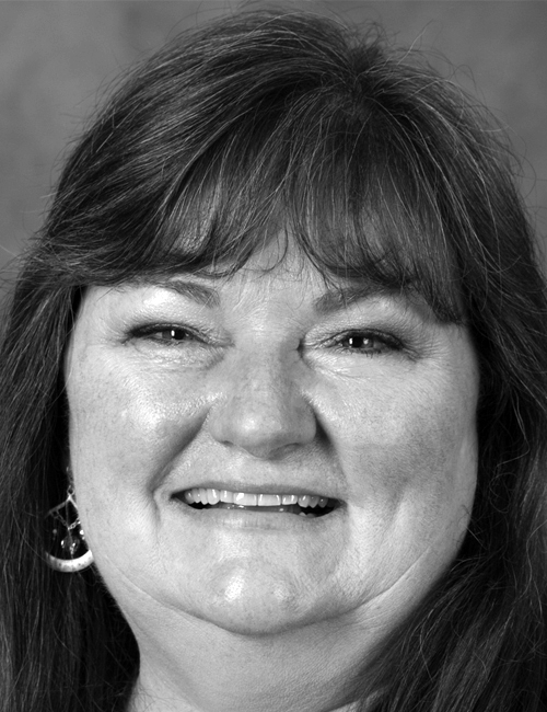 A portrait of Denise Lowe with text listing her role at University of Central Florida, address, telephone number, and email.
