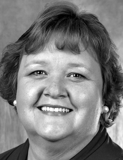 A portrait of Tina Calandrino with text listing her role at University of Central Florida, address, telephone number, and email.