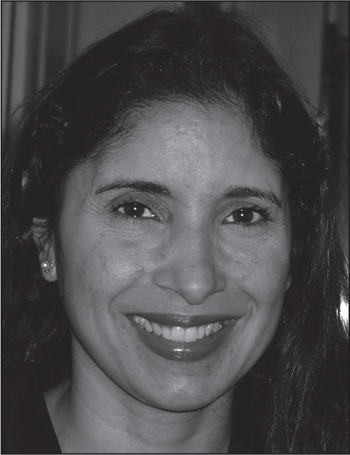 A portrait of Natalie B. Milman smiling, with her name, title, institution, and contact details below.