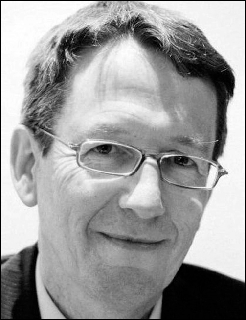 A portrait of Mike Joy with contact information for the University of Warwick Department of Computer Science.