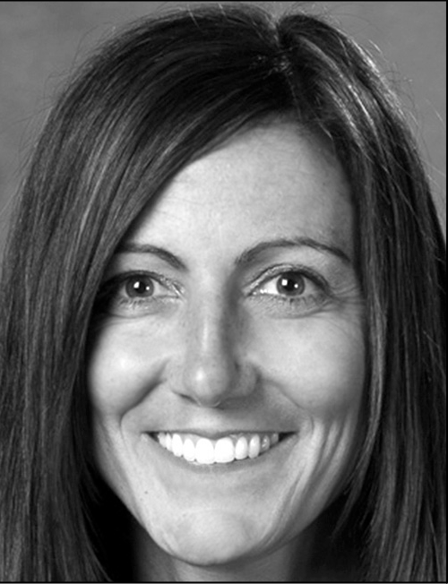 A portrait of Amy Winger with contact information for the University of Phoenix in Hudsonville, Michigan.