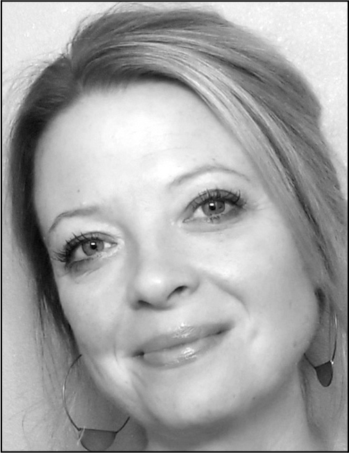 A black and white headshot of Beth Tuckwiller an associate professor at The George Washington University.
