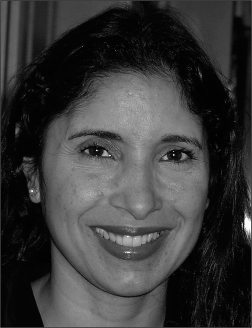 A portrait of Natalie B. Milman with contact details for George Washington University.