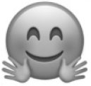 A face emoji with a slight smile and two hands on either side of its cheeks, as if hugging itself.