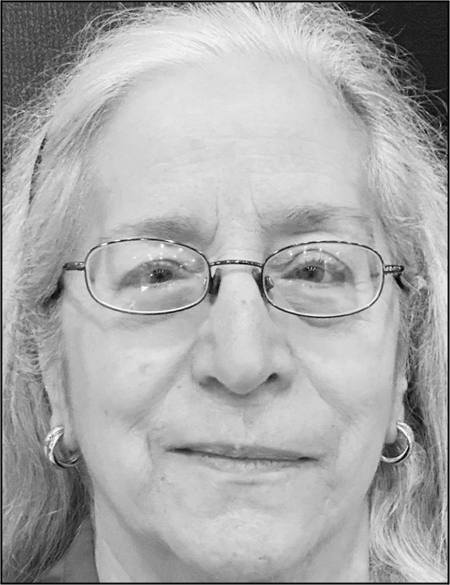 A portrait of María T. Redmon.