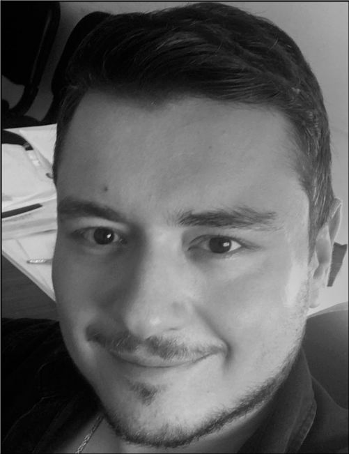 A portrait of Emre Yildiz.