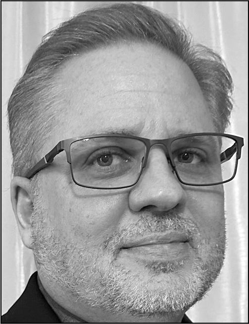 A portrait of Anthony Tolson.