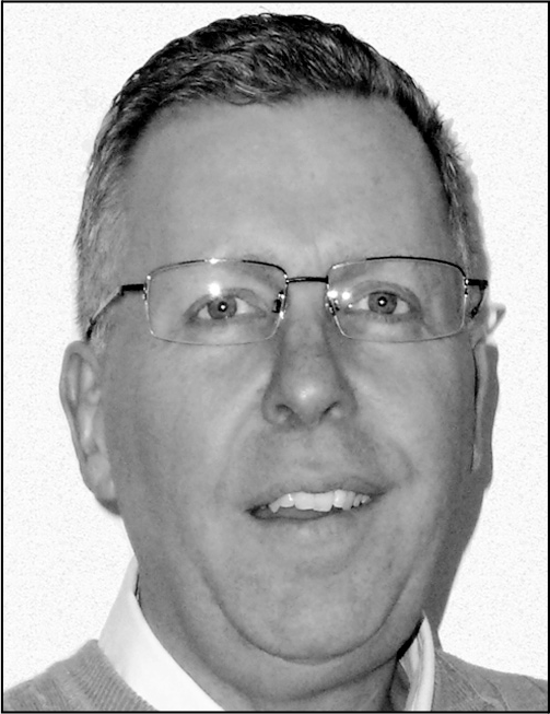 A portrait of Michael Corry.