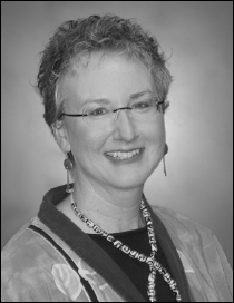 A headshot of Sally M. Johnstone, Executive Director at W I C H E, with her contact information.