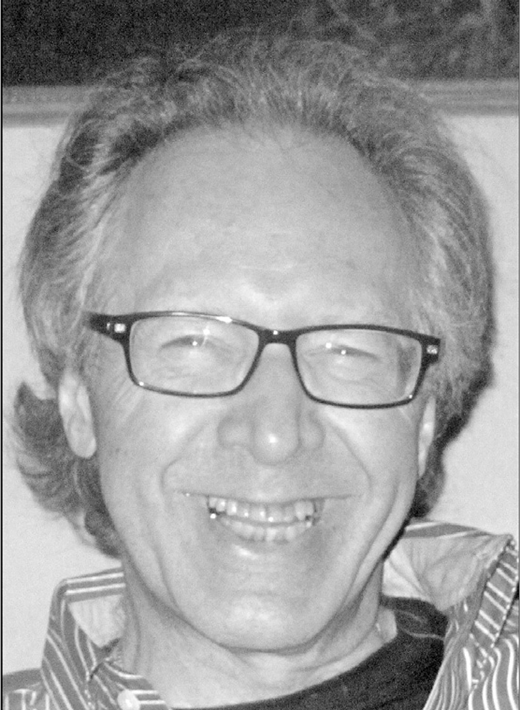 Black-and-white portrait illustration of a smiling man with glasses and wavy hair, labeled Errol Craig Sull below the image.