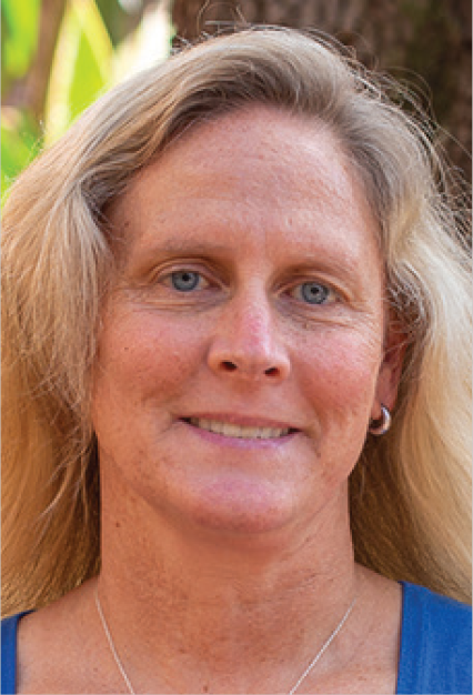 Kara Dawson with blonde hair, wearing a blue top.