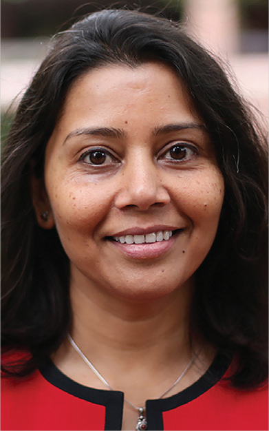 Swapna Kumar with dark hair, wearing a red and black top. Email, phone, and University of Florida address below each photos.