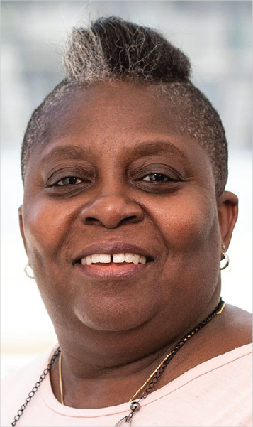 Camille Dickson-Deane, smiling, with short gray and black hair, University of Technology Sydney, Australia.