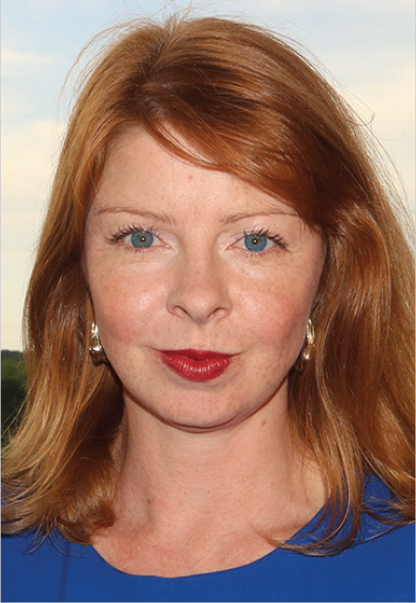 Erin Anderson from Georgia State University, with red hair and blue top.