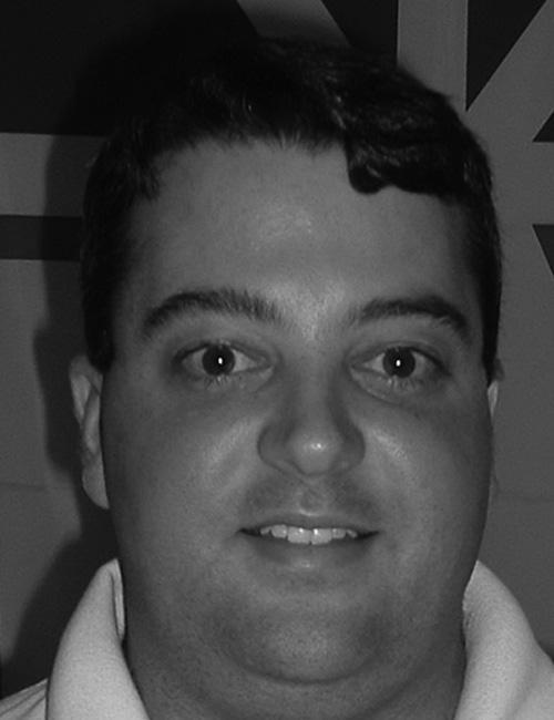 A portrait of a man beside text identifying him as Michael K. Barbour, with a University of Georgia address, telephone number, and email.