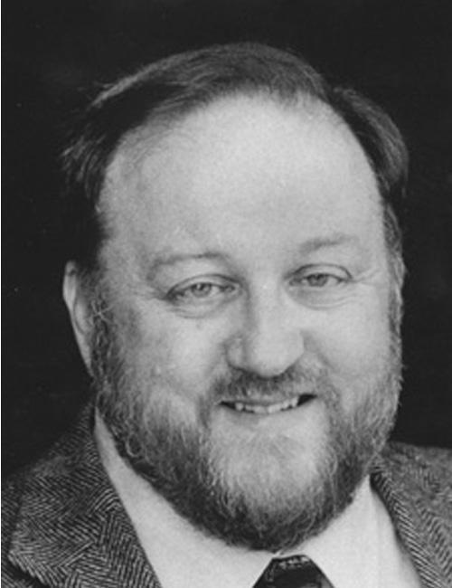 A portrait of a bearded man beside text identifying him as Zane L. Berge, Associate Professor in Instructional Systems Development at the University of Maryland Baltimore County, with an address and email.