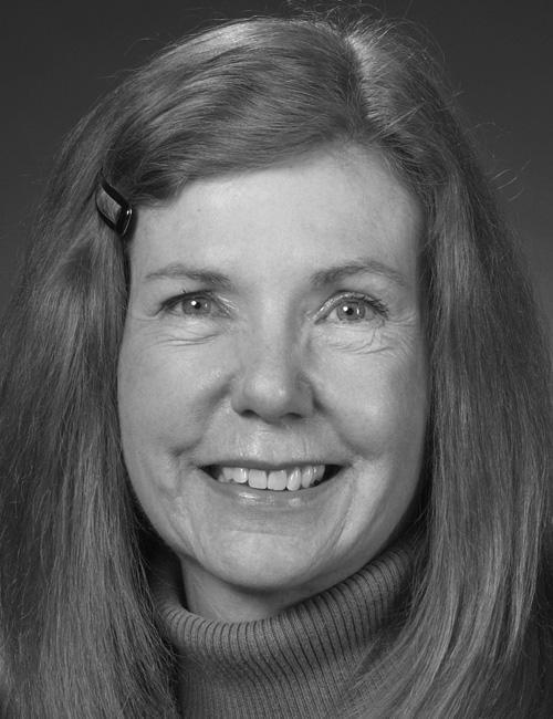 A portrait of Cornelia Flora with text identifying her as Director of the North Central Regional Center for Rural Development at Iowa State University, including her address, phone number, email, and website.