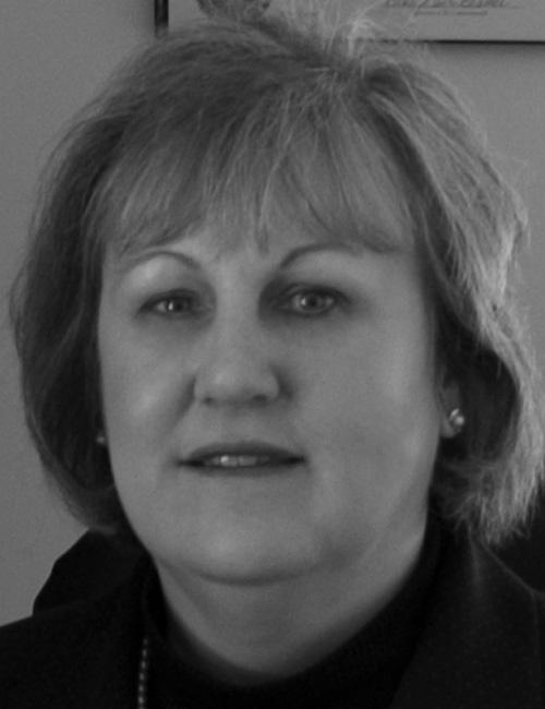 A portrait of Karan Powell with text identifying her as vice president and academic dean at American Military University, along with her email address.