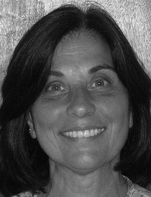 A grayscale portrait of a woman above printed text listing her name, job title, department, mailing address, telephone number, and email.
