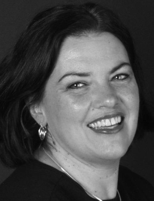 A grayscale portrait of a woman above printed text listing her name, job title, company affiliation, mailing address, telephone number, and email.