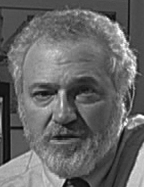 A portrait of a man above a text box that provides a university contact including title, institution, address, telephone number, and email.