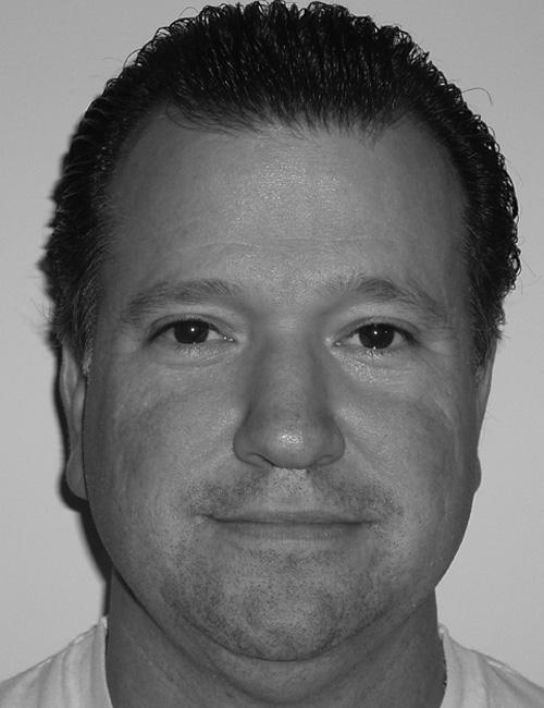 Black and white photo of Elias Garcell with contact info. He is Adjunct Professor in Office Systems and Technology at Broward Community College. Address, phone, and email are listed below.