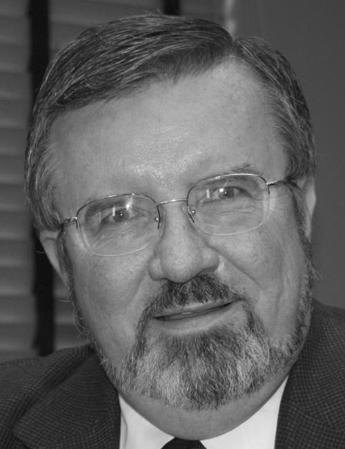 Black and white photo of Walter Weir, Chief Information Officer at University of Nebraska, with contact info including Lincoln address, phone, and email.