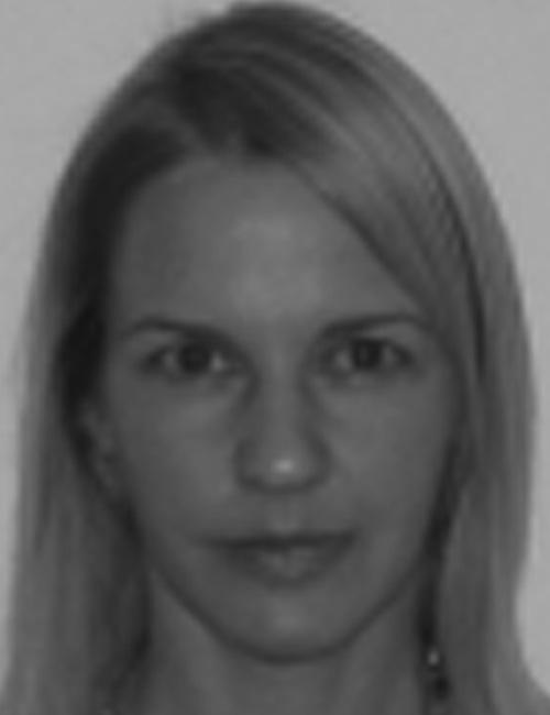 Black and white photo of Dawn Poulos with text listing her role as VP of Marketing at Xyleme, Inc., office address in Boulder, CO, phone number, and email contact.