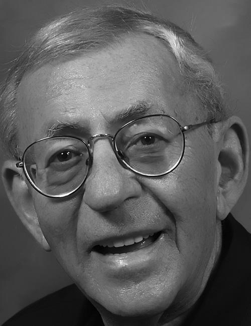 Black and white photo of Irving H. Buchen, older man with glasses and short gray hair, smiling. Text below includes his address in Ft Myers, FL, and email contact.