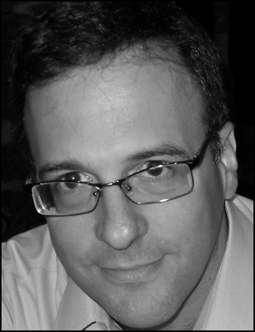 Photo of Andrew Ordover, Director of Academics for Kaplan Virtual Education. His phone number and email are listed.