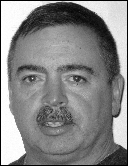 Black and white headshot of David M. Lorenz, Chief Master Sergeant, USAF, and Doctoral Student at Nova Southeastern University. His address and telephone number are listed below the photo.