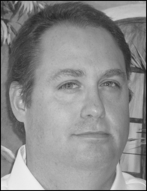 Black and white photo of Allen C. Grant along with full Contact Information.