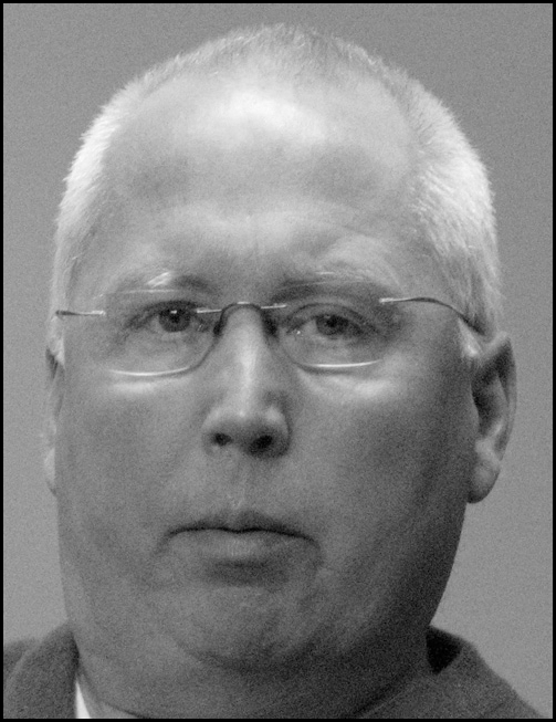 Black and white photo of Bob Plants as a Asst. Dean, along with full Contact Information.