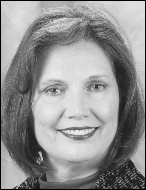 A portrait of a woman above text identifying Teresa Nichols, faculty at the University of Phoenix and counselor for the City of Pelham, A L, with her Pelham address, telephone number, and email inside a bordered rectangle.