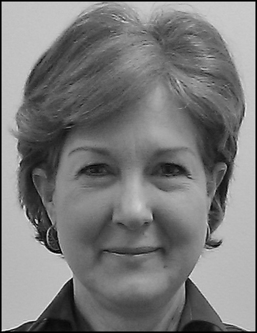 A grayscale head-and-shoulders portrait of an adult person above a block of professional information listing a faculty position, university affiliation, address, telephone number, and email.