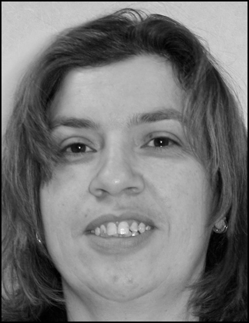 Portrait photograph centered in a bordered box with her name listing below as Khitam Azaiza, with job title Web Developer Analyst, organization Novo Southwestern University, street address, telephone number, and email address.
