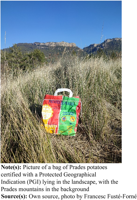 A photograph shows a colorful “PATATES DE PRADES” bag placed in tall grass with distant mountains under a clear blue sky.