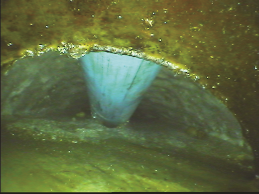 Typical endoscope image looking down the grease void Refer to the image caption for details.