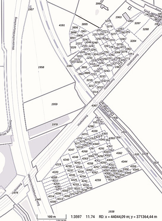 A detailed map depicts various plots of land with numerical identifiers, streets, and boundaries, arranged in a grid layout with road names indicated.