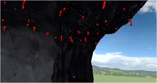 A photograph shows a dark rock overhang with colored scan points against a bright outdoor landscape.