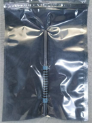 LTCC tube rolled over the mandrel and sealed in a polymer bag before isostatic lamination process.