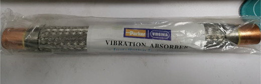 A high-pressure shock absorber hose in packaging.